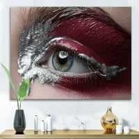 Designart 'aproape de un ochi de femeie cu machiaj roșu pe' Modern Canvas Wall Art Print